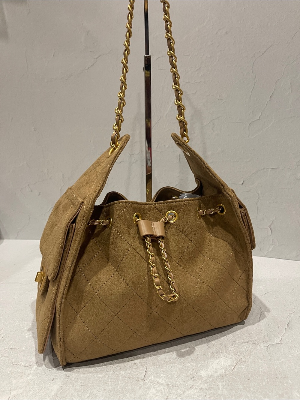 Quilted Drawstring Shoulder Bag in Camel